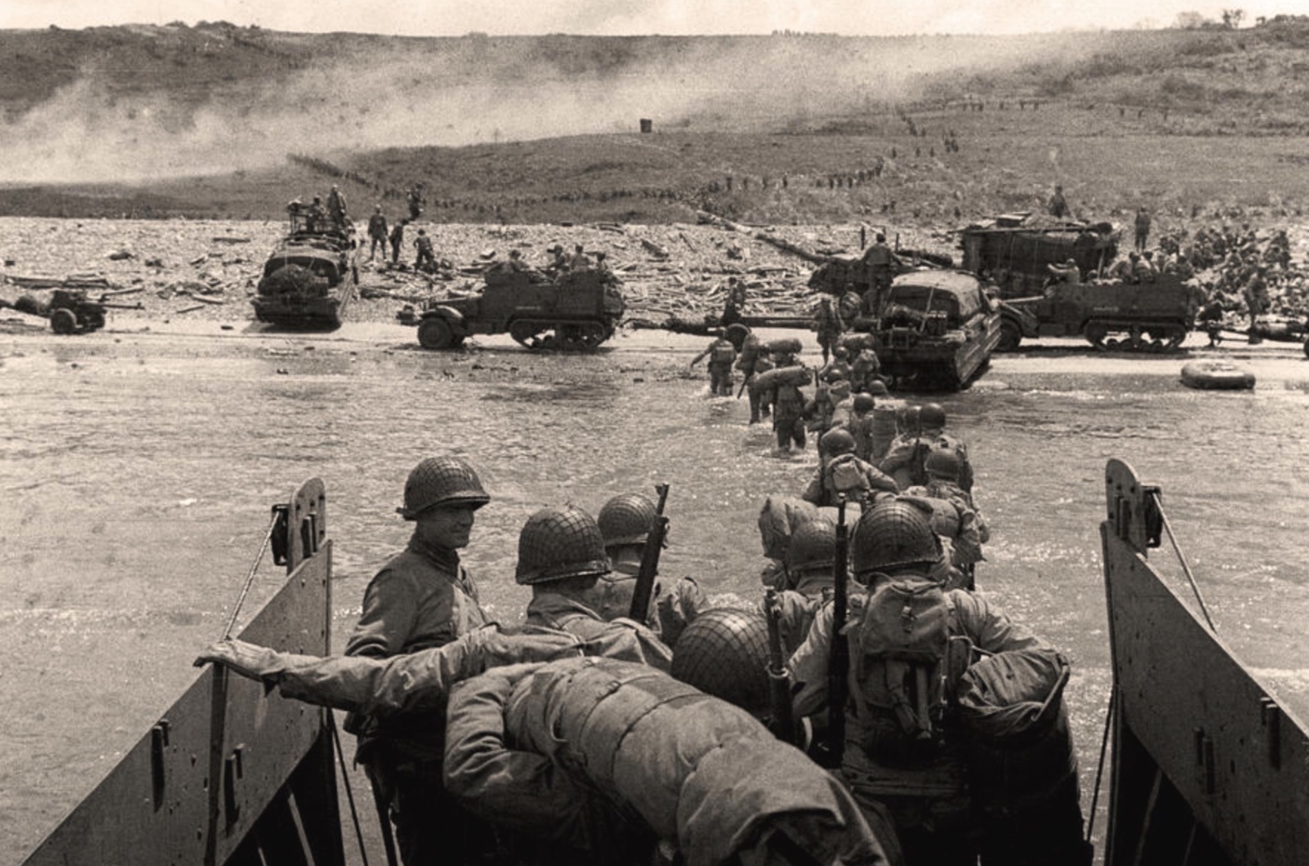 U.S. 1st Infantry Division, leaving a Higgins Boat on Omaha. 